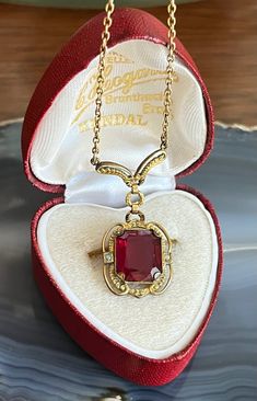 Item: Antique Art Deco Gold Filled Paste Ruby Seed Pearls Pendant Lavalier Drop Necklace. There are no stamps or hallmarks on this. Measurements: The chain is 18 inches long. The pendant is 1 & 3/8th inches long. Condition: Vintage, previously owned. Showing only minor signs of age/use/patina. There are a few tiny pin prick like nicks on the paste ruby. Please see our other listings, we combine shipping for savings. Ruby Necklace, Seed Pearl, Antique Art Deco, Drop Necklace, Pearl Pendant, Aging Signs, Ruby, Gold Filled, Favorite Jewelry