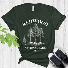 National Park Shirt, Redwood Shirt, California T-Shirt, Camping Hiking Tee, Redwood National All of our items are made to order. * Designs are printed with sustainable water based-ink * Different sizing may affect the placement of the final design. * Colors may differ slightly due to different user monitor and screen settings. * S I Z I N G * * Shirts are true-to-size for UNISEX fit. * Pre-shrunk * 100% combed and ring-spun cotton * Heather colors contain polyester * I do not accept returns, exchanges, or refunds for incorrect fit. * S H I P P I N G * Please make sure to double-check your shipping address when checking out. Your address cannot be changed once the order is placed. Please take the processing time into account when placing an order, . I ship with USPS First Class Mail, someti T Shirt Outfits, National Park Shirt, Redwood National Park, California Shirt, National Park California, Shirt Outfits, California National Parks, Gifts For Campers, Travel Shirts