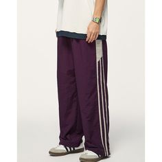 Sports Color Contrast Elastic Waist Wide Leg Casual Pants Material: 100% Nylon Size: S, M, L, XL, 2XL Color: Purple, Black Applicable Season: Spring, Summer Stretch Cotton Parachute Pants For Sports, Sports Parachute Pants Relaxed Fit Full Length, Sports Parachute Pants Relaxed Fit, Sporty Stretch Long Parachute Pants, Full Length Nylon Parachute Pants For Sports, Casual Nylon Cargo Pants For Sports, Casual Nylon Bottoms With Elastic Side Panels, Sporty Full Length Nylon Parachute Pants, Casual Solid Nylon Sweatpants