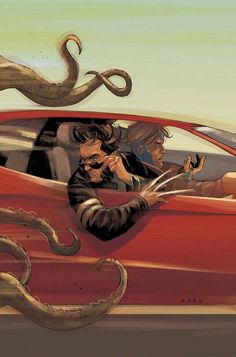 two people in a red car with an octopus on the roof and one person holding a cell phone to their ear