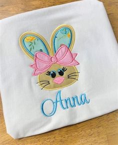 Easter Bunny Embroidered Shirt, Girls Easter Embroidered Shirt This cute Easter Bunny shirt will be a great addition to your child's personalized clothing.   Please include the child's name, if you do not want the name just let me know. Please note that all of my embroidered shirts have a soft cover over the stitching to help prevent irritation. Machine wash in cold water and hang or lay flat to dry. Colors may slightly vary depending on the device you use. All items are hand made.  It will take 3-7 days to make your items.  Please note this does not include shipping.  I ship USPS first class mail.  If you need your item sooner, upgrades are available at checkout. Due to personalization of items, I do not except returns.  If there is a problem with your order, please contact me first and w Personalized Clothing, Easter Bunny Shirts, Embroidered Shirts, Cute Easter Bunny, Bunny Shirt, Easter Girl, Cute Easter, Easter Shirt, Personalized Clothes