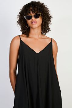 Black V neck floaty midi dress Chic V-neck Sundress For Vacation, Chic V-neck Rayon Maxi Dress, Maxi Length V-neck Dress For Date Night, Flowy V-neck Summer Dress, Chic V-neck Sundress For Spring, Black V-neck Midi Dress For Summer, Party V-neck Midi Dress In Viscose, V-neck Viscose Midi Dress For Party, Casual V-neck Maxi Dress For Daywear