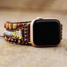 Showcase your style with this luxurious Boho Multilayer Wraps IWatch Strap, made with premium tiger eye, jasper and crystal beads. Its brown tones exude elegance and sophistication, making it the perfect accessory for your sophisticated look. Material: Jasper, Metal Beads, Crystal, Tiger Eye. 3 sizes: The length of watchband have 3 sizes: S-48cm/M-53cm/L-56cm. Fit for: Apple Watch series 8 7 6 5 4 3 2 SE. Band fits 5.3-7 inches wrist, compatible with 38mm-45mm apple watch face, easy to install, Brown Rectangular Jewelry, Brown Bohemian Beaded Bracelet, Handmade Watch Bands, Apple Watch Series 8, Apple Watch Face, Band Fits, Apple Watch Faces, Energy Stones, Brown Tones