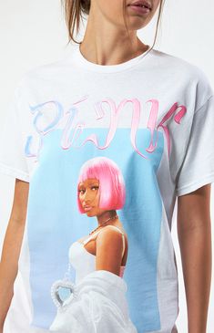 Rock street style with the Nicki Minaj Oversized T-Shirt from Bravado. Featuring a striking Nicki Minaj graphic on the front, this tee is a nod to the iconic rapper's signature style. With its oversized fit, it offers both comfort and edgy flair, making it the perfect statement piece for any casual ensemble.


	Solid color tee
	Short sleeves
	Crew neckline
	Front graphic
	Oversized fit
	100% cotton
	Machine washable
	Model is wearing a size small
	Model measurements: 5’8.5” height, 31.5” bust, 24” waist, 35.5” hips 90s Inspired Letter Print T-shirt For Streetwear, Oversized Pink Graphic T-shirt, 90s Style T-shirt For Spring Streetwear, 90s Style Spring Streetwear T-shirt, Hip Hop Graphic Design T-shirt For Spring, Spring Streetwear T-shirt With Front Print, Hip Hop Style Pink T-shirt With Screen Print, 90s Style Streetwear T-shirt, Hip Hop Crew Neck T-shirt