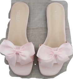 Chic Wedding Sandals For Summer, Chic Slip-on Flip Flops, Chic Pink Slip-on Slides, Elegant Formal Flat Slides, Elegant Evening Slides, Elegant Summer Beach Flats, Elegant Flat Slides For Formal Occasions, Pink Closed Toe Flats For Summer, Elegant Low Heel Summer Flats