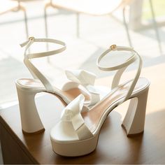 Turn To Gianvito Rossi For Statement Shoes Like These Platform Pumps. Resting On 2.75 In / 70mm Curved Block Heels, They're Wrapped In White Satin And Topped With Half-Bows On The Straps - Keep Your Feet Together To Create A Whole One On Your Special Day. Bachelorette, Wedding, Party! Used Once For Wedding On Beach! Will Send Professional Photo Of Shoes If Wanted! Wedding On Beach, Wedding Shoes Platform, Statement Shoes, Rossi Shoes, Statement Shoe, On Beach, Platform Pumps, Professional Photo, White Satin