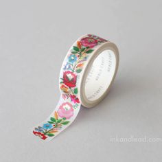 a roll of washi tape with flowers on it