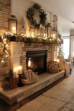 a living room with a fire place and christmas decorations on the mantle