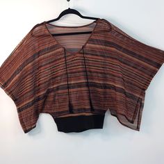 A Unique Top Knit Fabric, Cotton Waist Band, V Neckline With A Black String , See Through , Square Sleeves With A Open Detailed , Small, Multi Color Casual V-neck Top, One Size, Casual One Size V-neck Top, One Size Brown Tops For Layering, Brown One Size Tops For Layering, One Size Chic V-neck Tops, Chic One Size V-neck Top, Summer Knit Blouse For Layering, Brown Summer Blouse For Layering, Summer Knit Tops With Batwing Sleeve