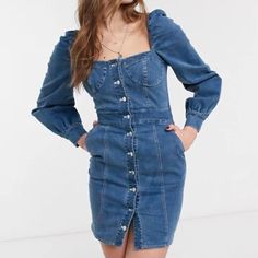 This Blue Denim Mini Dress By Emory Park Features A Sweetheart Neckline With Bust Detail, Button Down Placket, And Subtle Puff Sleeves. You’ll Love The Feminine Bustier / Corset Look, Stretchy Fabric That Shows Of Your Silhouette, And Most Importantly, Pockets! Size: Xs Color: Blue Denim Condition: New Without Tags (Nwot). It’s Beautiful But Has Just Been Hanging In My Closet With Nowhere To Go. Feel Free To Make An Offer Or Ask For Measurements! Denim Blue Buttoned Mini Dress, Mini Denim Dress With Buttons, Trendy Denim Blue Mini Dress With Buttons, Trendy Dark Wash Mini Dress With Buttons, Trendy Denim Blue Dress With Buttons, Fitted Denim Blue Puff Sleeve Dress, Blue Fitted Denim Dress With Puff Sleeves, Fitted Blue Denim Dress With Puff Sleeves, Fitted Denim Blue Dress With Puff Sleeves