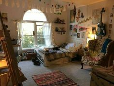 a living room filled with furniture and lots of clutter