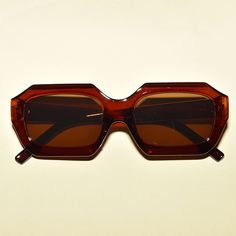 "These 1960's vintage inspired sunglasses feature a mod retro rectangular angular design, have an squared shaped lens, provide UV400 protection. Measurements: L 5.5\" x W 1 3/4\"" Rectangular Brown Sunglasses For Party, Brown Rectangular Sunglasses For Party, Classic Rectangular Sunglasses For Party, Vintage Square Sunglasses With Tinted Lenses, Retro Square Sunglasses With Tinted Lenses, Retro Rectangular Sunglasses With Uva Protection, Rectangular Sunglasses With Uva Protection For Party, Retro Rectangular Sunglasses With Polarized Lenses, Retro Rectangular Polarized Sunglasses