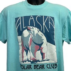 Vintage Alaska Polar Bear Club T Shirt Large 80s Swimming Swimmer Plunge Mens Blue Stedman Single Stitch Made In USA Graphic Tee CONDITION: Has minor image cracking - no other flaws noticed. Has been washed and is ready for you to wear. Tag is a X-Large but I feel it measures more similar to a modern Large. Check measurements to ensure fit. See photos. SIZE AND MEASUREMENTS: Mens/Unisex Large Width 21.5" - Underarm to underarm Length 28.5" - Measure from top of shoulder at the edge of collar to Vintage Alaska, Usa Tee, Club T Shirt, Mens Graphic Tee, True Vintage, Vintage Tees, Polar Bear, Vintage Tshirts, Blue Man