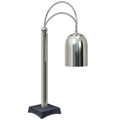 a lamp that is sitting on top of a metal pole and has a light attached to it