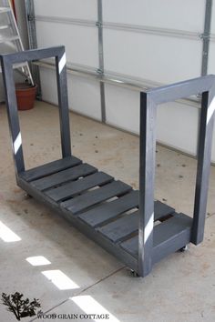 a metal shelf sitting next to a garage door