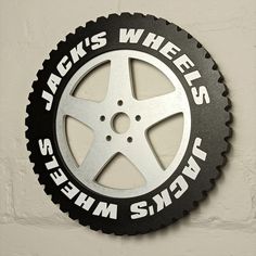 a black and white sign that says noah's wheel is steep show on it