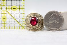 N6231 Vintage University of Massachusetts 14K Yellow Gold Ruby Class Ring Big 1970 BBA (8.25) VINTAGE 1970 UMASS UNIVERSITY OF MASSACHUSETTS CLASS RING. BIG BOLD HEAVY RING. SYNTHETIC RUBY. HAS BEEN RESIZED AT SOME POINT. AMAZING RING WONDERFUL HIGHEST QUALITY. JUST PART OF MY MOST RECENT ESTATE FINDS! FOLLOW ME TO SEE THEM ALL! Brand: University of Massachusetts Metal: 14K Yellow Gold Metal Purity: 14k Material: Ruby Ring Size: 8.25 Other Dimensions: 22.2mm W Form: Class Ring Big 1970 BBA Age: Vintage 14k Rings For Commemoration, Vintage 14k Stamped Rings For Commemoration, Classic Gold Ruby Ring Collectible, Heirloom Ruby Ring With Polished Finish, Collectible Heirloom Ruby Ring With Polished Finish, Vintage Engraved Ruby Ring For Formal Occasions, Rare Collectible Ruby Ring, Vintage Red Engraved Ring, Rare Round Ruby Ring For Collectors