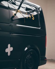 a black van with writing on the side