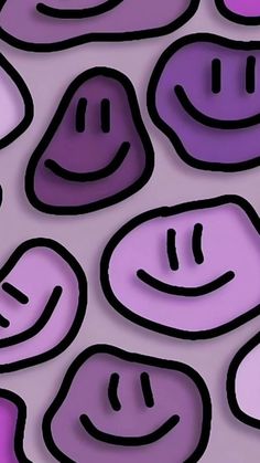 purple and black smiley faces are arranged in an abstract pattern