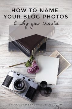 an old camera, notebook and flowers on a table with the words how to name your blog