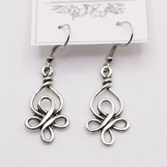 Handmade Earrings Style: Celtic Knot Dangle Comes With Organza Bag New Makes A Great Gift For Any Occasion Or Holiday! Don't Forget To Check Out My Other Styles! Keywords: Irish, Celtic, Knot, Present, Hanging, Earring, Drop, Birthday, Gift, Handmade, Made In Usa, Nj Artist, Female Owned, Artisan, Craft Irish Knot, Wig Jig, Wire Jig, Hanging Earring, Celtic Knot Earrings, Diy Wire Earrings, Wire Wrap Jewelry Designs, Wrap Earrings, Irish Celtic