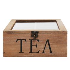 a wooden box with the word tea on it