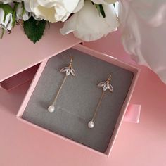 * DETAILS * - Natural Freshwater Baroque Pearls - Gold Plated CZ Paved Flower Charms 16*12mm ✨You may also like the matching necklace in the photos. Here is the link. https://www.etsy.com/JinnysJewelryBySeJin/listing/1258313379/14k-gold-filled-lariat-necklace-y-pearl?utm_source=Copy&utm_medium=ListingManager&utm_campaign=Share&utm_term=so.lmsm&share_time=1656464095232 ------------------------------------------ * CARE TIPS * ⭐️TO PREVENT TARNISH: Keep your jewellery in airtight plastic bags. It w Elegant Leaf Shaped Earrings As Gift, Elegant Leaf-shaped Earrings For Gift, Elegant Leaf-shaped Jewelry With Matching Earrings, Elegant Rose Gold Leaf Jewelry, Elegant Rose Gold Leaf-shaped Jewelry, Elegant Jewelry With Dangling Charms, Elegant Leaf-shaped Jewelry For Party, Elegant Leaf-shaped Party Jewelry, Teardrop Flower Charm Jewelry For Wedding