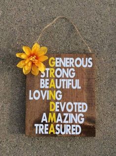 a wooden sign that says generous strong beautiful loving devoted amazing treasures with a yellow flower on it