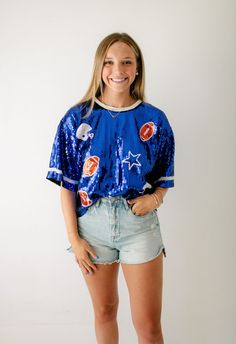 Get ready for game day with X's and O's Royal Blue Sequin Top! This top is not only fun, but also the perfect addition to your wardrobe. Pair it with your favorite shorts for a winning look! Fits true to size, Morgan is wearing a medium. She is 5'7, a size 6 and a 34C Buddy Love, Mink Pink, Dress Gift, Sequin Top, Sale Design, Summer Collection, Royal Blue, Shirts Tops, Rompers