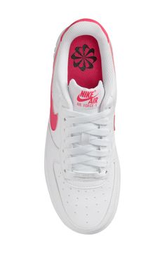 Smooth synthetic leather creates a classic low profile sneaker that is set on a trendy sole. Round toe Logo details Lace-up White sole Manmade upper and sole Imported White Aster, Nike Air Force 1 07, Nike Air Force 1, Synthetic Leather, Air Force 1, Nike Air Force, Low Profile, Air Force, Womens Sneakers