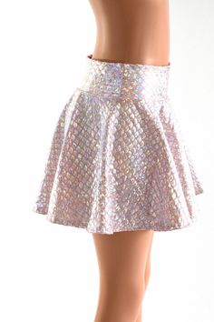 "This item is made to order, please read all the way through the listing before purchasing! Silvery scales shimmer on baby pink in this holographic mini skirt. This fabric has such a gorgeous sparkle and shine! It is made of four way stretch lycra spandex. It has a soft, spandex waistband (elastic free) that sets at the natural waist. Need help choosing \"Length\"? Watch this video: https://www.youtube.com/watch?v=qTKmmJGrjW8&t=1s Womens Sizing (See below for instructions on where measuremen Summer Princess Style Fitted Skirt, Fitted Pink Sequin Skirt, Pink Fitted Sequin Skirt, Fitted Pink Skirt With Sequins, Pink Fitted Skirt With Sequins, Stretch Mermaid Skirt For Party, Pink Fitted Skirt For Costume Party, Fitted Pink Skirt For Costume Party, Summer Party Mermaid Bottoms