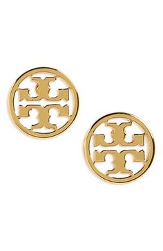 The iconic Tory Burch logo sits in delicate circle stud earrings that finish your look with a sophisticated and refined touch. 3/8" diameter. Post back. 16k-gold plate, 18k-rose gold plate or silvertone plate. By Tory Burch; imported. Classic Gold Jewelry With Logo, Classic Yellow Gold Jewelry With Logo, Elegant Gold Jewelry With Logo, Sew Heart, Snowy Pinecone, Circle Stud Earrings, Berry Wreath, Art Jewelry Contemporary, Heart Pillow