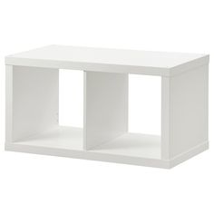 a white shelf with two open sections