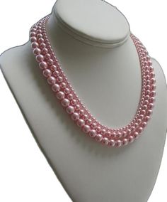 Pink Pearl Jewelry With Pearl Chain, Classic Pink Pearl Chain Jewelry, Pink Single Strand Pearl Jewelry, Pink Pearl Single Strand Jewelry, Feminine Pink Pearl Necklace, Feminine Pink Pearl Necklace For Wedding, Pink Single Strand Pearl Necklace, Pink Pearl Single Strand Necklace, Pink Necklace Set