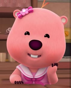 a cartoon bear with a pink bow sitting at a table