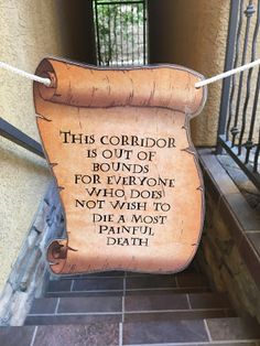 a sign that is hanging on the side of a building saying, this corridor is out of bounds for everyone who does not wish to do it