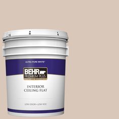 a white paint bucket with the label behr ultra stain and primer in one