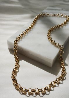 The Mia Chain! Luxury made to wear and layer on a daily basis. This elegant piece is not plated, and it will not tarnish! Life is expected - wear with confidence! Elegant, ageless, and classy. This looks great alone or layered. Comes wrapped ready to gift. -- 24K GOLD FILLED LOBSTER CLASP CLOSURE CHOOSE YOUR LENGTH -- **Picture 1 is pictured at 15.5'' **Picture 3 is pictured at 21'' Also available in silver and as a bracelet. Designer tip: layer at 15.5'' with the Feline Medallion at 20'': https Everyday Metal Necklaces With Rolo Chain, Metal Cable Chain Necklace For Layering, Metal Necklace With Double Oval Link Chain, Everyday Necklace With Chunky Oval Link Chain, Metal Double Chain Necklace With Oval Links, Oval Link Double Chain Metal Necklace, Gold-tone Jewelry With Rolo Chain, Chunky Chain Metal Necklace For Layering, Everyday Gold Chain Toggle Necklace