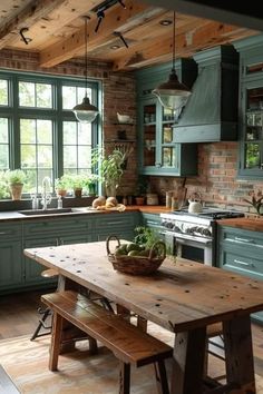 a kitchen with green cabinets and wooden table in the center, surrounded by potted plants