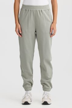 Comfort meets style with the Lena Track Pant Dusty Olive. Crafted from 100% mid weight Terry Cotton, these track pants are a must have addition to your athleisure collection. 100% Cotton French Terry Classic track pant with elasticated waist and design seam detailing Embroidered classic logo Elasticated cuffs Cutaway pockets Relaxed Tapered Leg Sweatpants In Solid Color, Everyday Solid Sweatpants, Everyday Solid Pull-on Sweatpants, Solid Everyday Pull-on Sweatpants, Solid Color Sweatpants With Pull-on Style For Everyday, Solid Everyday Sweatpants With Pull-on Style, Relaxed Joggers With Elastic Waistband, Relaxed Joggers With Elastic Waistband And Straight Hem, Everyday Athleisure Joggers With Straight Leg