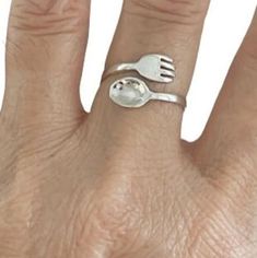 About item Item:- Fork and Spoon ring Material:- 925 sterling silver Title:- Vintage Sterling Silver Fork and Spoon Adjustable Ring, Fork Ring, Spoon ring, Gift For mom, Kitchen set ring, Gift For her, Women's ring Description:- We use 925 sterling silver to making jewelry. We accept all types of custom & personalized order. Please send us a message if you are interested in a custom creation. Shipping profile:- We ship all order within 3-5 days. But custom order takes time. Customer service :- If you have any question about our products & services, feel free to contact us. We do always best for our customers Other Specification:- Please Visit Our Shop home page to view our complete collection. If you need express shipping, please choose express shipping profile during checkout. Please make Silver Stackable Rings For Mother's Day Promise, Silver Rings For Mother's Day, Adjustable Ring Jewelry For Mother's Day, Sterling Silver Open Band Jewelry Gift, Sterling Silver Open Band Jewelry For Gifts, Sterling Silver Stackable Open Ring As Gift, Sterling Silver Open Band Rings As Gifts, Nickel-free Ring For Mother's Day, Adjustable Nickel-free Rings For Mother's Day