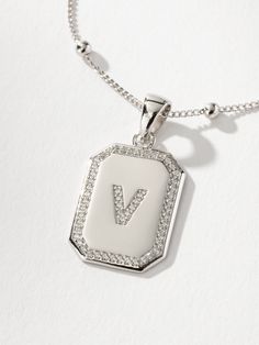 Sur 2.0 Necklace | Sterling Silver V | Product Detail Image | Uncommon James Silver Charm Necklace With Rectangular Pendant And Initials, Silver Square Pendant Initial Necklace For Everyday, Silver Initial Necklace With Square Pendant For Everyday, Everyday Silver Initial Necklace With Square Pendant, Silver Pendant Initial Necklace With Delicate Chain, Trendy Silver Initial Pendant Necklace, Silver Initial Pendant Chain Necklace, Silver Initial Necklace With Rectangular Pendant, Trendy Silver Initial Necklace With Clavicle Chain