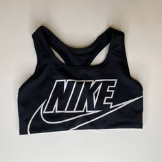 Nike Swoosh Sports Bra. Medium Support. Made With At Least 75% Recycled Fibers. Dri-Fit. New With Tags. Size S. No Holds Or Trades. Fitted Activewear With Logo Print For Gym, Fitted Gym Activewear With Logo Print, Black Logo Print Top For Training, Stretch Activewear With Logo Print For Gym, Fitted Black Activewear With Logo Print, Functional Activewear With Logo Print For Workout, Black Workout Top With Logo Print, Black Logo Print Athleisure Activewear, Athleisure Activewear With Logo Print For Workout