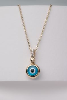 📌About the necklace: Our evil eye necklace is made from 14 karats solid gold, Murano glass, and white cubic zirconia stones on the loop. 14k Gold Evil Eye Jewelry Gift, Yellow Gold Diamond Evil Eye Jewelry, Yellow Gold Diamond Jewelry With Evil Eye, Evil Eye Diamond Jewelry As Gift, Diamond Evil Eye Jewelry Gift, Evil Eye Diamond Jewelry Gift, Diamond Evil Eye Jewelry In Yellow Gold, Gold Diamond Jewelry With Evil Eye, Gold Diamond Jewelry With Evil Eye Detail