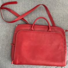 Beautiful Red Leather Computer Bag Or Work Bag. Lodis, Never Used, Flawless Interior And Clean Exterior With A Minor Scuff (See Pic). Classy And Timeless For Anyone. Red Business Shoulder Bag With Adjustable Strap, Red Business Bag With Adjustable Strap, Red Rectangular Laptop Bag For Everyday, Red Rectangular Laptop Bag, Red Leather Travel Briefcase, Red Rectangular Briefcase, Modern Red Satchel For Travel, Red Laptop Satchel Bag, Red Laptop Bag For Everyday Use