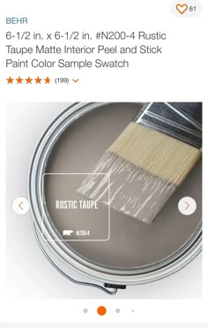 a paint can with a brush on top of it and the words rustic taupe next to it