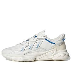 The adidas Ozweego 'White Blue Bird' is a modern take on a classic design. Featuring a tumbled leather upper in an off-white hue, with blue tubing inspired by the lacing system of the original Ozweego 3, this shoe is both stylish and comfortable. A Velcro heel overlay allows you to customize the look of the shoe with interchangeable patches, while the Adiprene+ cushioning provides superior comfort. Adidas Leather Sneakers With Three Stripes, Adidas Leather Sneakers For Light Sports, Adidas Leather Sneakers For Casual Sports, Modern White Adidas Sneakers, Modern Adidas Leather Sneakers, Adidas Ozweego White, Adidas Originals Ozweego, Adidas Ozweego, Marathon Running Shoes