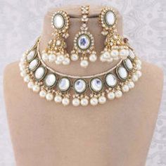 Gold Rodium Polish White and Off White color Necklace in Metal Alloy studded with Kundan, Pearl Luxury White Kundan Necklace With Intricate Design, Luxury White Kundan Necklace With Stone Work, Luxury Traditional Dual-tone Necklaces, Luxury White Kundan Sets, Luxury White 22k Gold Kundan Necklace, Luxurious Antique Temple Necklace For Ceremonial Occasions, Luxury 22k Gold White Kundan Necklace, Maroon Necklace, Violet Necklace