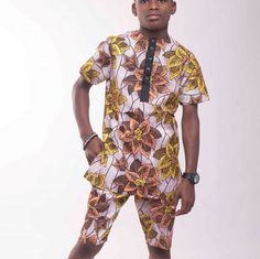 Add color to his ward rope this summer with this sophisticated slim fitted Ankara outfit - Made of 100% cotton/poplin - Classically styled with a round neck , short sleeve and buttoned chest - 2 front side slant pockets - 2 back patch pockets - Button closure with zip fly - Belt loops for a custom fit - SLIM FIT Cotton Short Sleeve Summer Sets, Multicolor Short Sleeve Summer Sets, Fitted Cotton Sets For Summer, Fitted Cotton Summer Sets, Yellow Fitted Short Sleeve Set, Multicolor Cotton Sets With Crew Neck, Multicolor Cotton Crew Neck Sets, White Cotton Short Sleeve Sets, Fitted Multicolor Short Sleeve Set