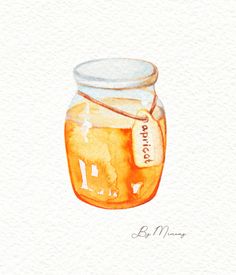 a jar filled with honey sitting on top of a table